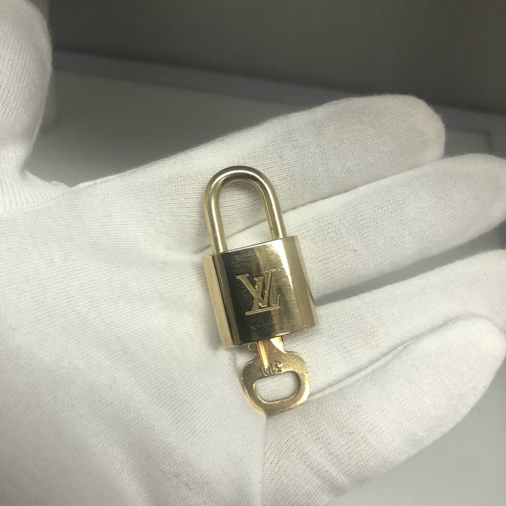 Louis Vuitton Brass Lock and Key & 310